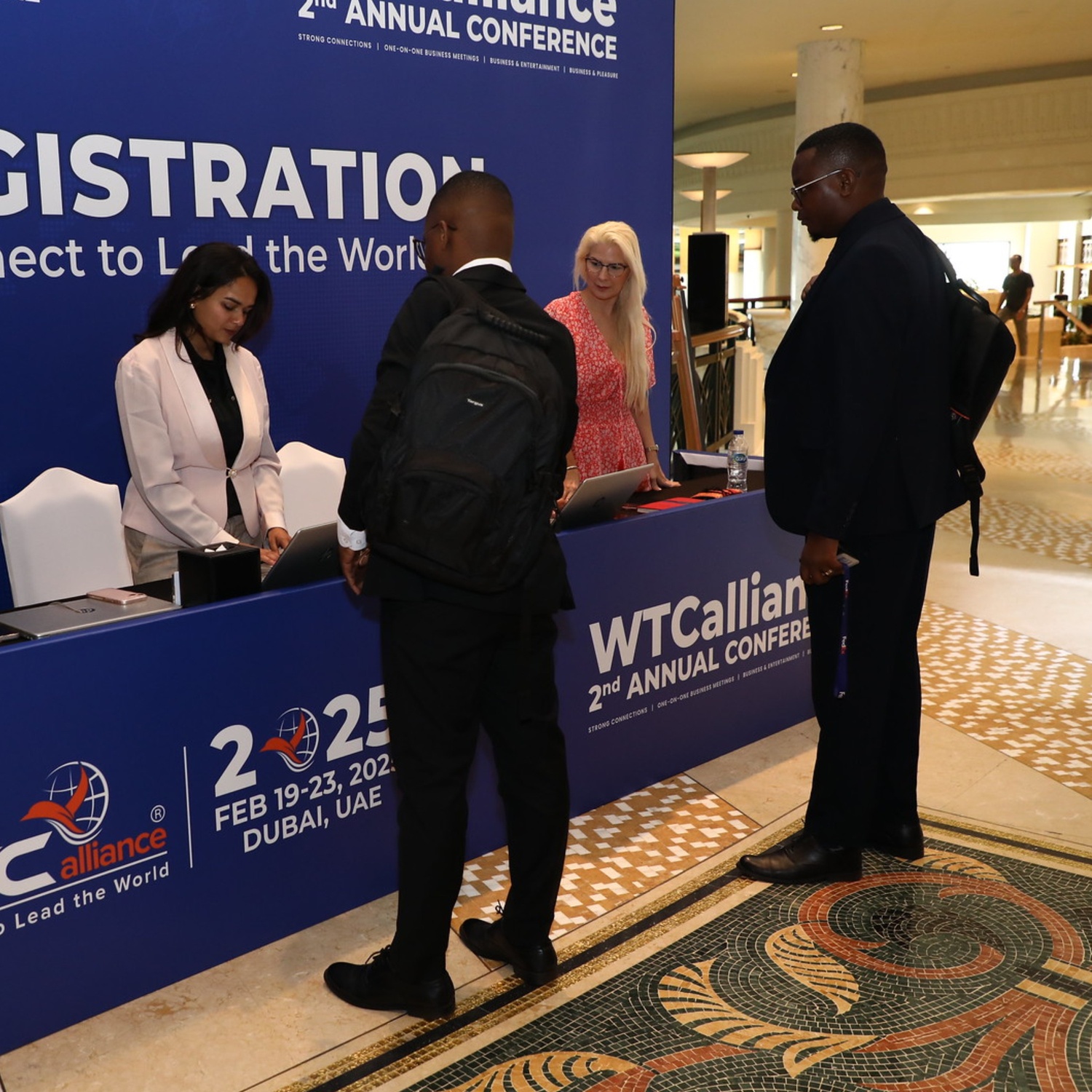 Registration desk at WTCalliance AGM 2025 – delegates arriving for the global logistics conference